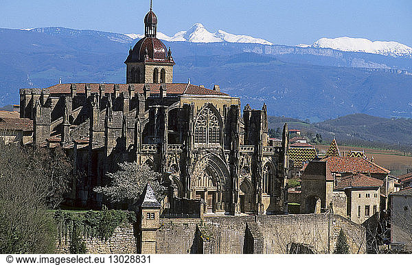 France  Isere  Saint Antoine l'Abbaye  labelled Les Plus Beaux Villages de France  a stop on el Camino de Santiago  gothic abbatial church dated 12th and 15th centuries  with at the background the summit of the Grande Moucherolle (2284 m)  Vercors range