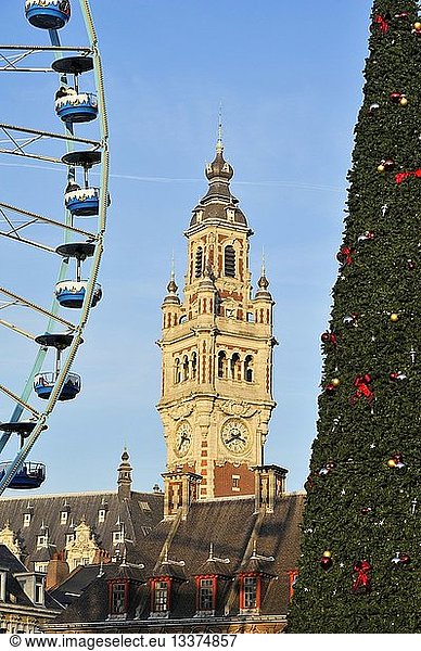 France  Nord  Lille  Place du General de Gaulle or Grand Place  belfry of the Chamber of Commerce and Industry beteween the big wheel and the giant Christmas tree installed for Christmas and New Year