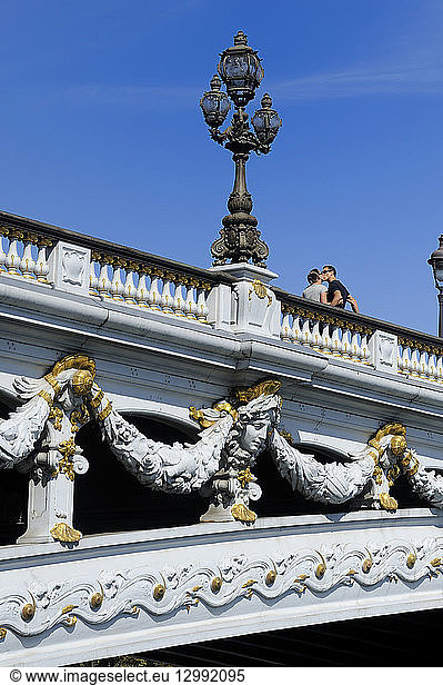 France  Paris  area listed as World Heritage by UNESCO  pont Alexandre III  bridge's deck  sculpture representing Zeus