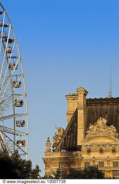 France  Paris  area listed as World Heritage by UNESCO  The Big Wheel and the Louvre museum (summer 2009)