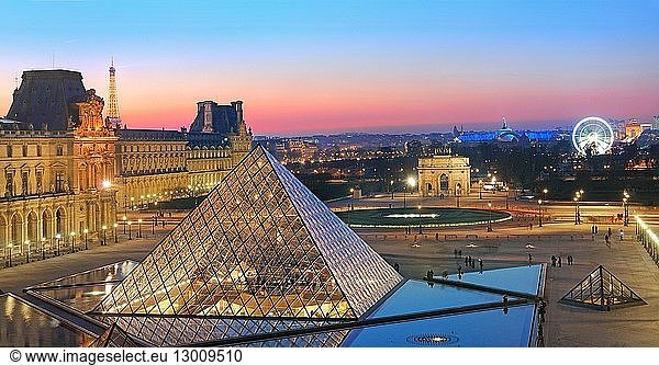 France  Paris  area listed as World Heritage by UNESCO  the pyramid of the Louvre Museum by architect Ieoh Ming Pei  the arch of the Carrousel  the glass roof of the Grand Palais  the great Wheel and the Arch of Triumph