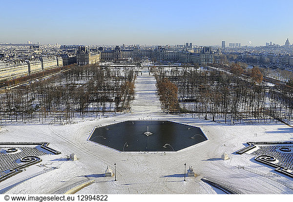 France  Paris  area listed as World Heritage by UNESCO  the Tuileries Gardens rearranged by Le Notre under the snow and the Louvre Museum in the background