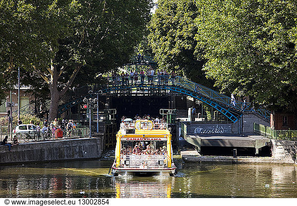 France  Paris  Canal Saint Martin  Canauxrama  touristic boat  entrance of the lock