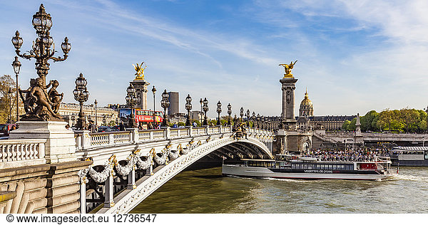 France  Paris  Tourist boat and tour bus at Pont Alexandre III