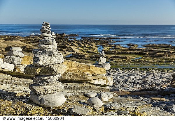 France  Pyrenees Atlantique  Pays Basque  Urrugne  Cairn at the foot of the Flysch cliffs of the Bask Corniche