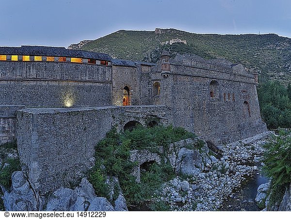France  Pyrenees Orientales  Natural regional park Catalan Pyrenees  listed as World Heritage by UNESCO  listed as The most beautiful villages in France  Villefranche de Conflent  walls of the fortress lit night
