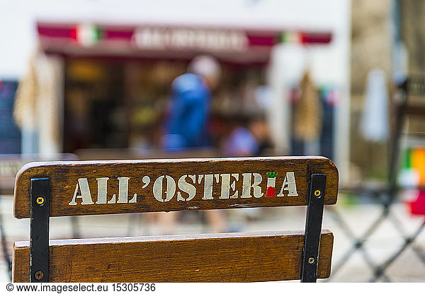 France  Saint-Remy-de-Provence  sign All'Osteria on folding chair at kiosk