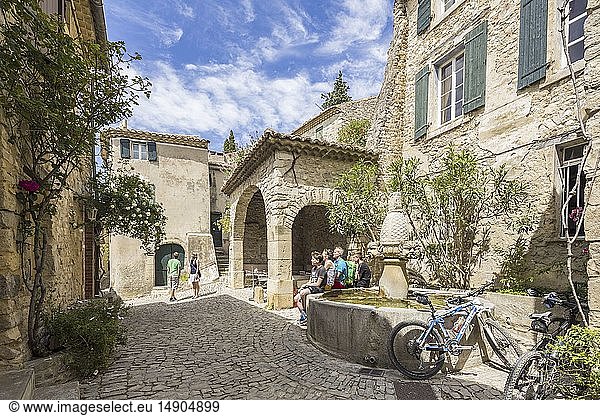 France Vaucluse Seguret labelled Les Plus Beaux Villages de France (The Most Beautiful Villages of France) the Fontaine des Mascarons (fountain with grostesque mask) of the 15th century
