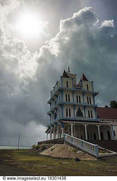 France  Wallis and Futuna  Sun shining over Lausikula Church during cloudy weather