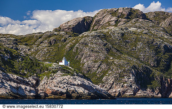 Francois Bay Lighthouse on rocky coast of Newfoundland