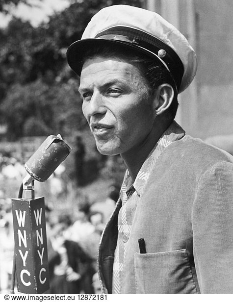FRANK SINATRA (1915-1998). American singer and actor. Photographed while singing at a block dance on the mall in Central Park  New York City  3 July 1943.