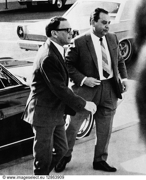 FRANK SINATRA (1915-1998). American singer and actor. With his attorney  Milton Rudin  arriving at a Las Vegas courthouse. Photograph  1967.