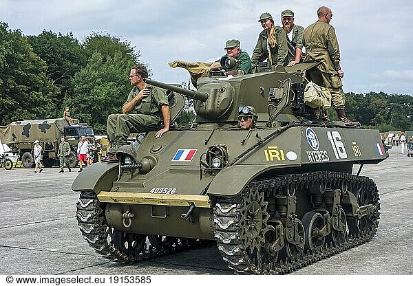 Free French M3A3 Stuart tank during WW2 military vehicles parade at Wold War Two militaria fair