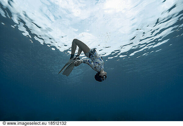 Freediver in the clear waters of the Andaman Sea in Thailand