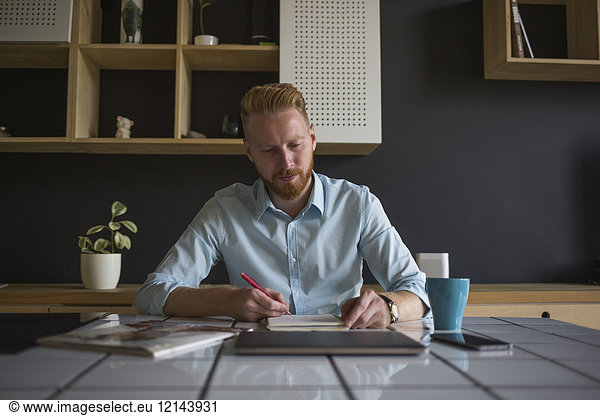 Freelance businessman working at home