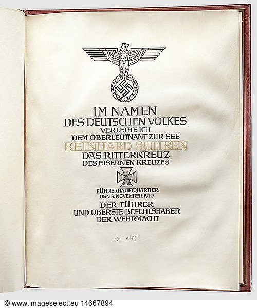FregattenkapitÃ¤n Reinhard 'Teddy' Suhren - an award document with folder for the Knight's Cross of the Iron Cross of 1939  Large  double-page parchment document to the then Oberleutnant with calligraphic text and national eagle dated 3 November 1940  at the bottom the original ink signature of Adolf Hitler. Suhren's name rendered in gold letters  with the corresponding felt cover. Dimensions 43.5 x 34.7 cm. Red leather folder  the exterior with a gold-stamped eagle  the inside signed at lower right 'Frieda Thiersch'. Dimensions 45 x 36.5 cm. Slightly knocked. Included are contemporary newspaper clippings and modern photographic prints  historic  historical  1930s  20th century  navy  naval forces  military  militaria  branch of service  branches of service  armed forces  armed service  object  objects  stills  clipping  clippings  cut out  cut-out  cut-outs  document  documents