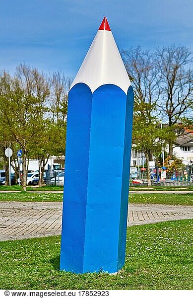 Freiburg  Germany  April 2022: Large blue pencil at Seegarten park  Europe