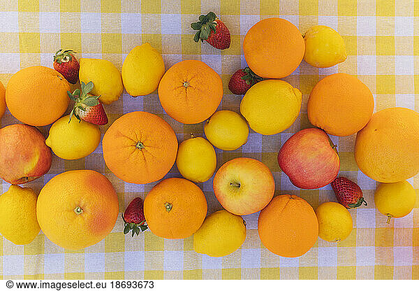 Fresh citrus fruits on table