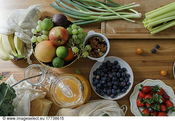 Fresh fruits and vegetables on table at home