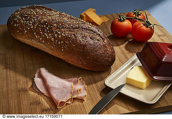 Fresh ingredients on cutting board to prepare sandwich