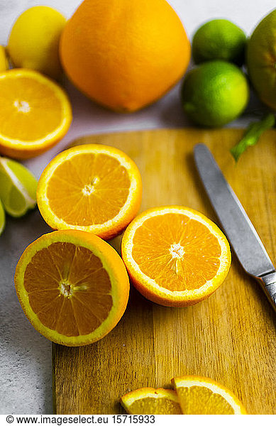 Freshly cut oranges on cutting board