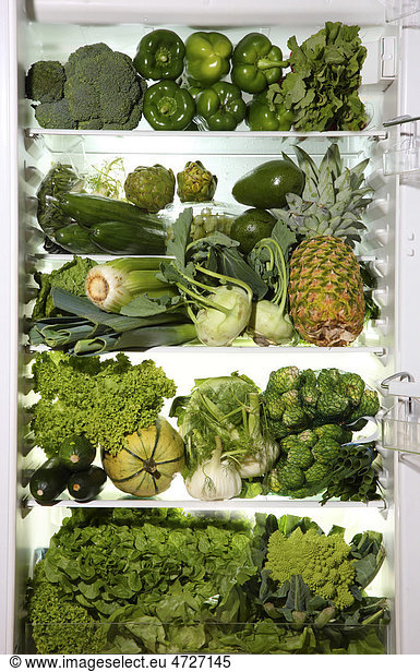 Fridge filled with different kinds of vegetables and fruit