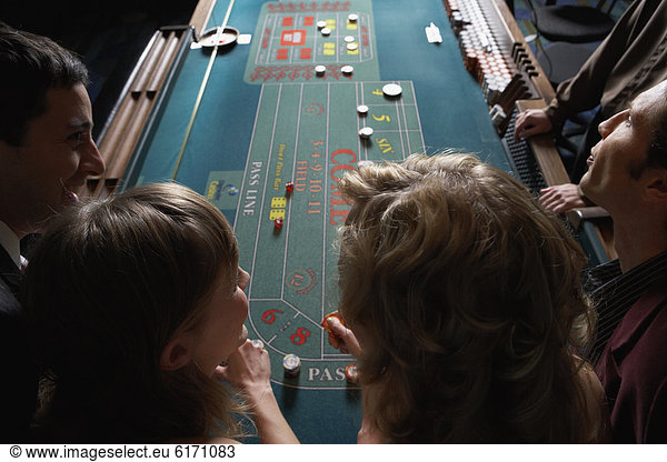 Friends gambling at a casino