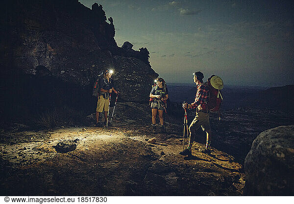 Friends wearing headlamps doing overnight hike on Cederberg Mountains