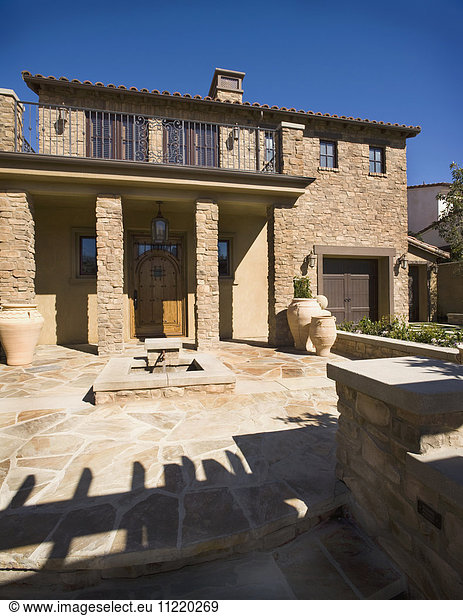 Front exterior tuscan style home