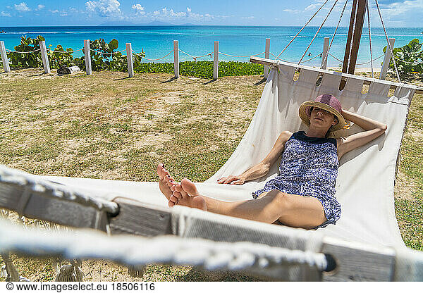 Front view of woman resting on hammock  Caribbean  Antilles