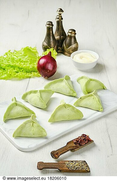 Frozen dumplings with spinach