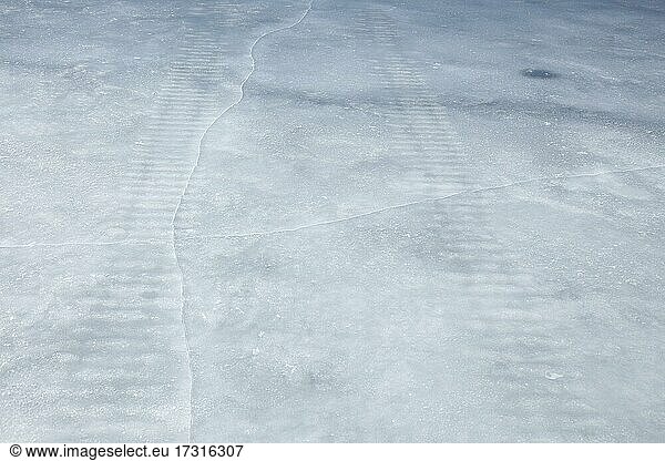 Frozen snowmobile prints  Saint Lawrence River  Province of Quebec  Canada  North America