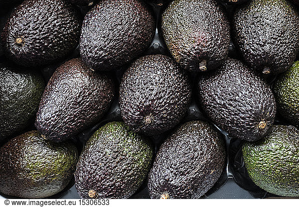 Full frame close up of fresh avocados.