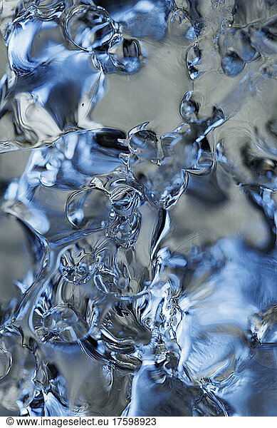 Full frame of clear melting ice