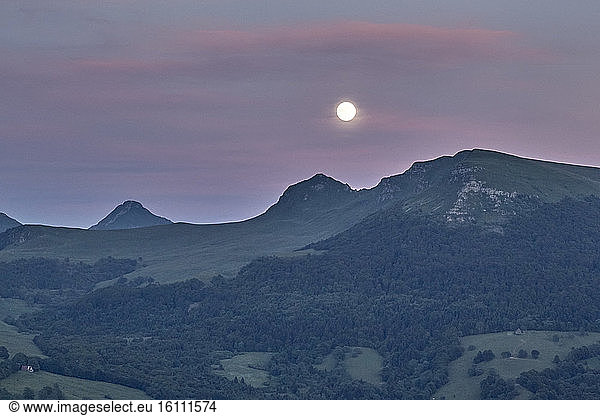 Full Moon above the Cantal Mountains  Regional Natural Park of the Auvergne Volcanoes  France