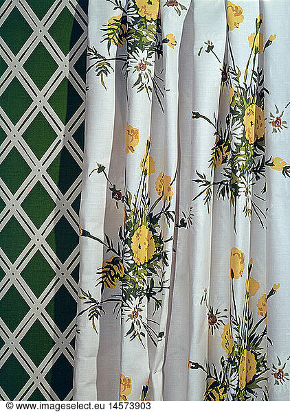 furnishings  curtain with floral pattern in front of wallpaper with rhomb pattern  1970s