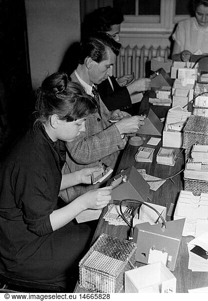 games  lottery  Lotto  Toto  students checking lottery tickets  Berlin  Germany  1950s
