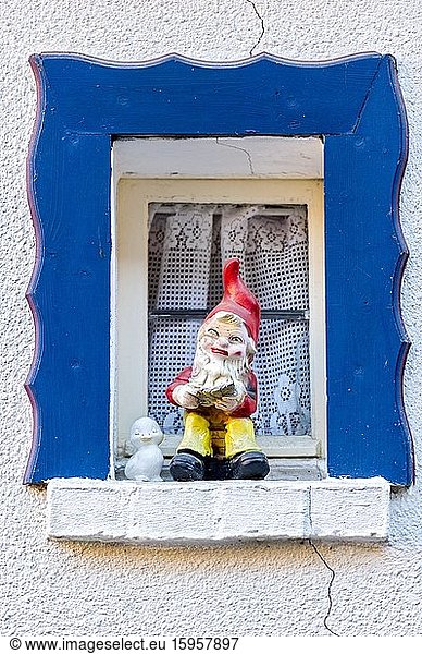Garden gnome at small window  Steinau an der Straße  Hesse  Germany  Europe