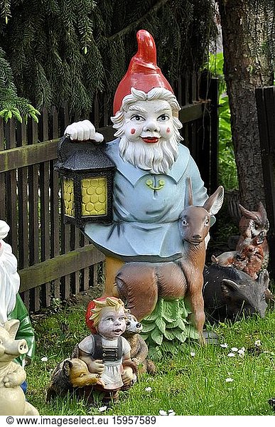 Garden gnome with lantern and deer  Büches near Büdingen  Hesse  Germany  Europe