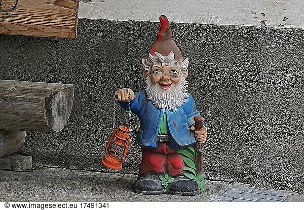 Garden gnome with paraffin lamp