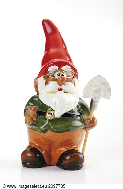 Garden gnome with spade  close-up