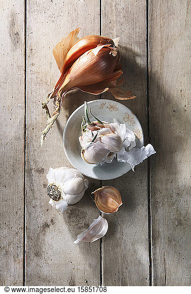 Garlic Onions Still Life on Wood Table