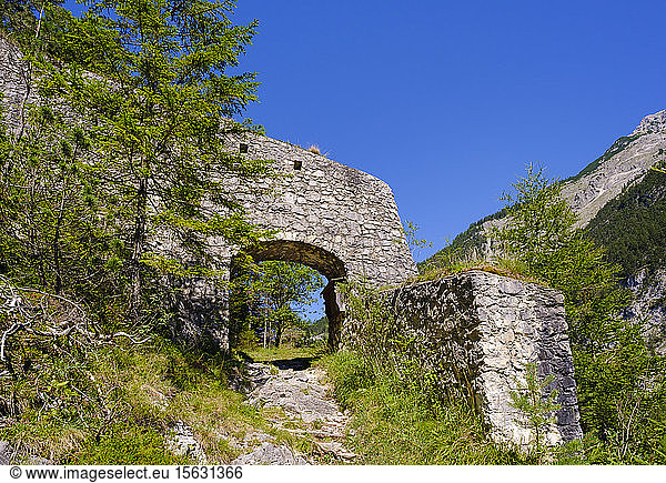 Gate in defensive wall of Porta Claudia against clear blue sky at Scharnitz  Tyrol  Austria