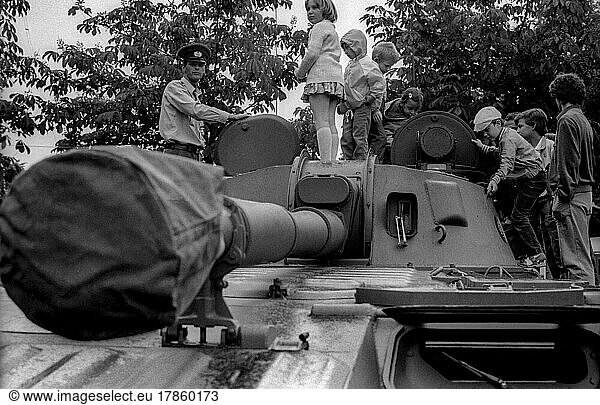 GDR  Berlin  18. 06. 1987  ND (Neues Deutschland) Press festival  in Volkspark Friedrichshain  NVA military show  tank  soldier  children