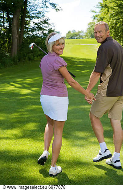 gehen  Golfsport  Golf  Rückansicht  Kurs