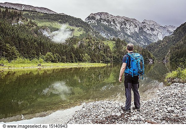 geography / travel  Austria  Styria  Man at a lake  Reservoir  Prescenyklause  Salzatal  Austria