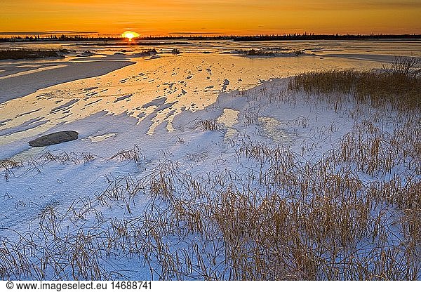 geography / travel  Canada  Manitoba  Churchill  Sunset over a frozen lake in the Churchill Wildlife Management Area  Churchill  Manitoba  Hudson Bay