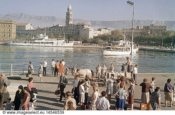 geography / travel  Croatia  Split  castles  Diocletian's Palace  built circa 300  exterior view from the harbour  26.9.1961  in the background the Kozjak Mountains  Europe  Diocletian  20th century  historic  historical  1960s  60s  Dalmatia  UNESCO World Cultural Heritage Site  people  ships