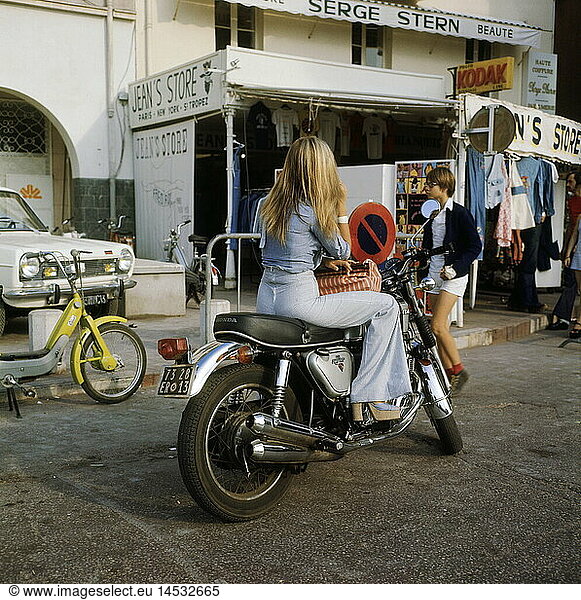geography / travel  France  Saint Tropez  street scene  girl sitting on motorbike  1970s
