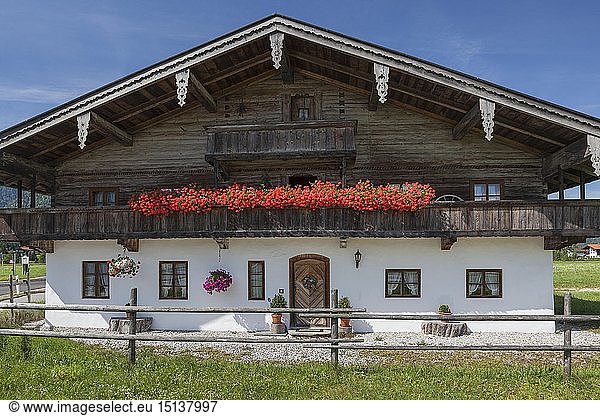 geography / travel  Germany  Bavaria  Inzell  geranium on the balcony of an old farmhouse in Inzell  Chiemgau  Upper Bavaria